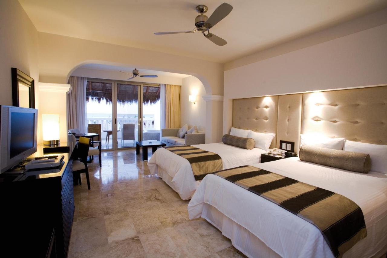 Grand Sunset Princess Playa del Carmen Exteriér fotografie A room at the Grand at Moon Palace